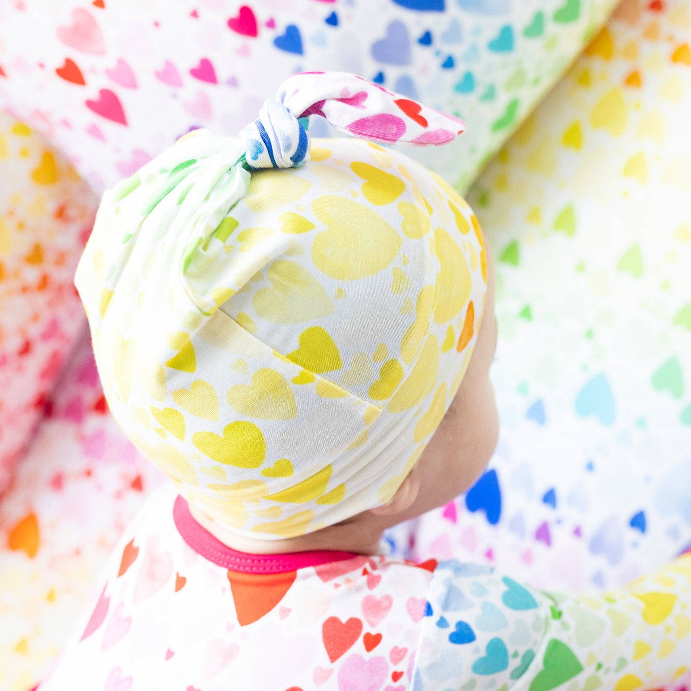 Macaron + Me - Rainbow Hearts Top Knot Hat